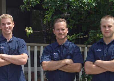 Three members of the Heald family representing five generations of mechanical trade experience